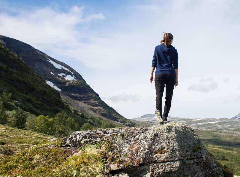 Person standing on a rock